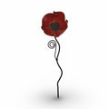 A single red flower-shaped ornament with a spiral design on a thin metal stem.